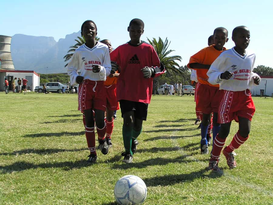 Camissa Township Social Soccer Tour - Walking through the township with a local guide
