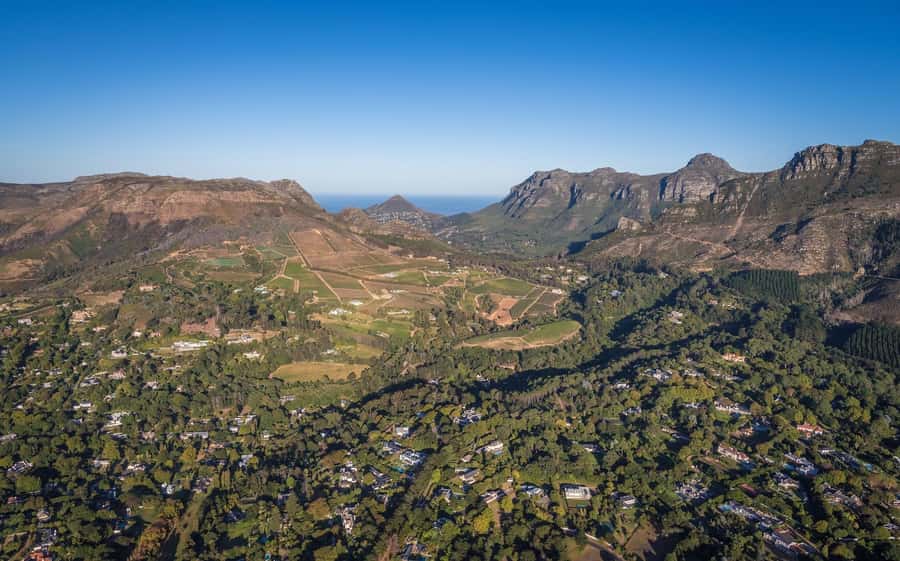 Cape Town: 2 Oceans Helicopter Flight with Boat Tour Ticket - Crossing the peninsula toward False Bay