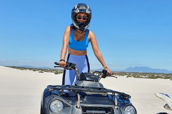 Cape Town Atlantis Dunes Quad Biking - Cresting the dunes with Table Mountain behind you