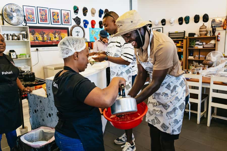 Cape Town: Authentic African Cuisine Cooking Experience - Sharing the finished food around one table