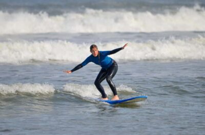Learn to surf with the best view of Table Mountain