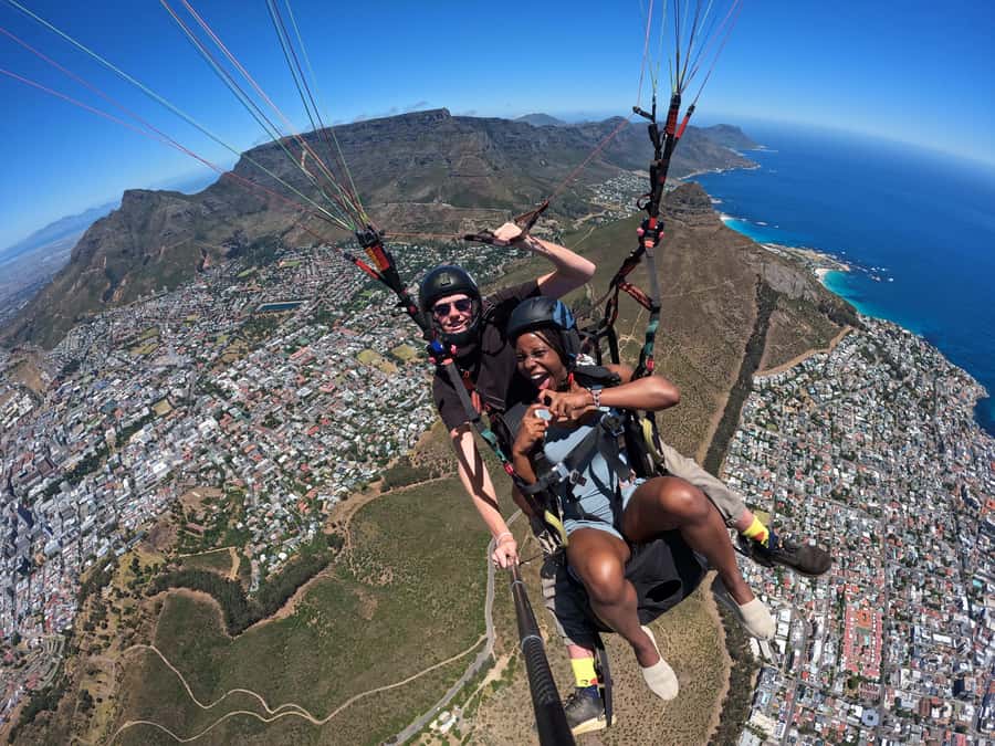 Cape Town: Tandem Paragliding with views of Table Mountain - In the air above Sea Point, Camps Bay, and Table Mountain