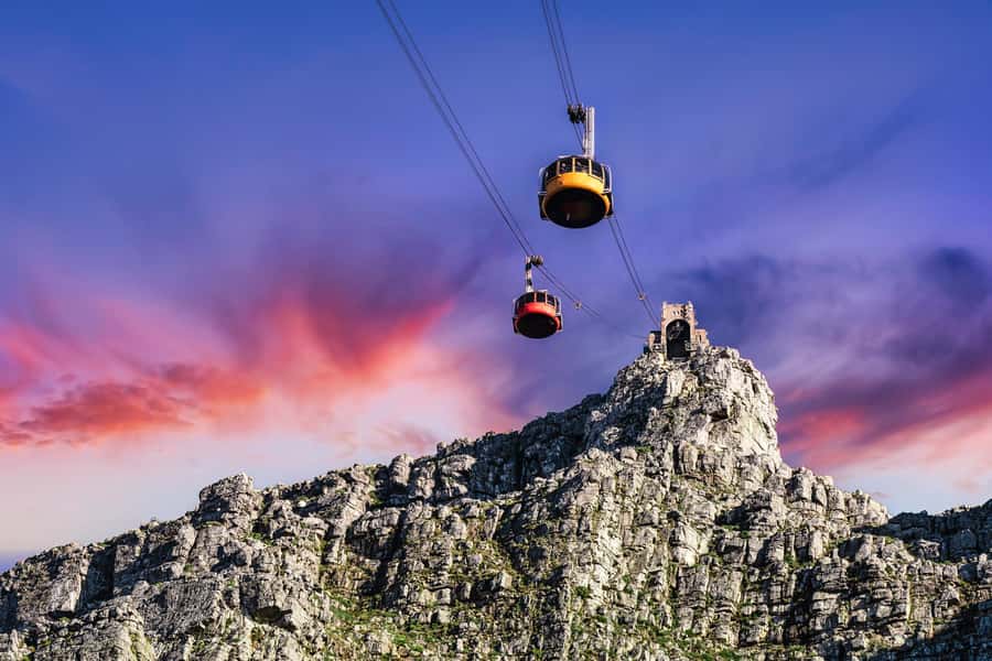 The Table Mountain cableway above Cape Town at sunset