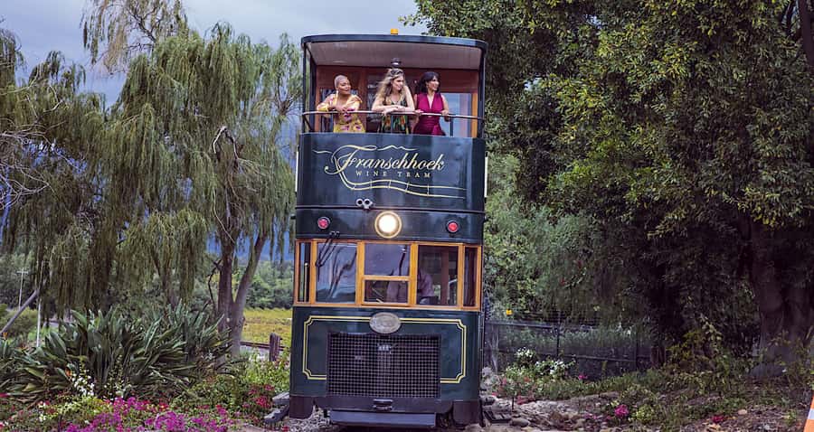 Cape Town: Wine Tram & Winelands Tour with Tastings & Pickup - Riding the Franschhoek Wine Tram