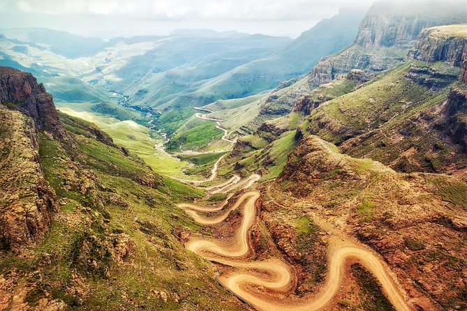 Durban: Journey along the Epic Sani Pass & Lesotho Tour - Climbing Sani Pass in a 4x4