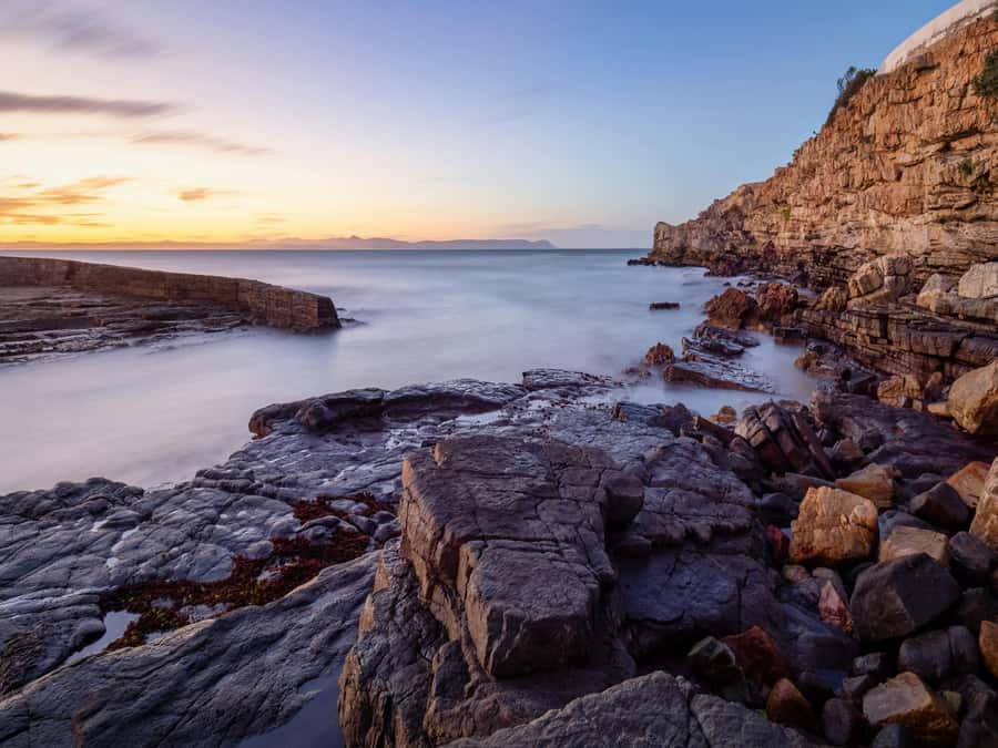 Full day Cape Penisula Tour: Chapman's Peak - Cape Point - Muizenberg brings a different coastal character