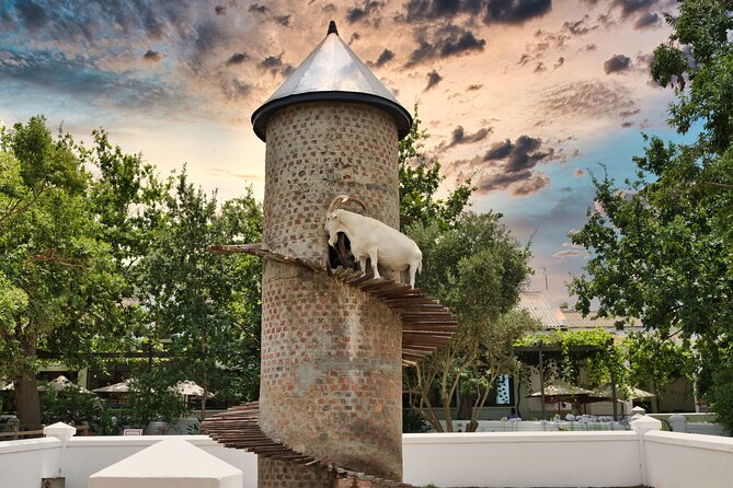 Full Day Cape Winelands Private Tour - The Huguenot Memorial sets up Franschhoek
