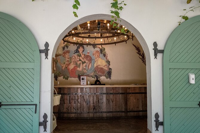 Full Day Cape Winelands Private Tour - Fairview begins with wine and cheese
