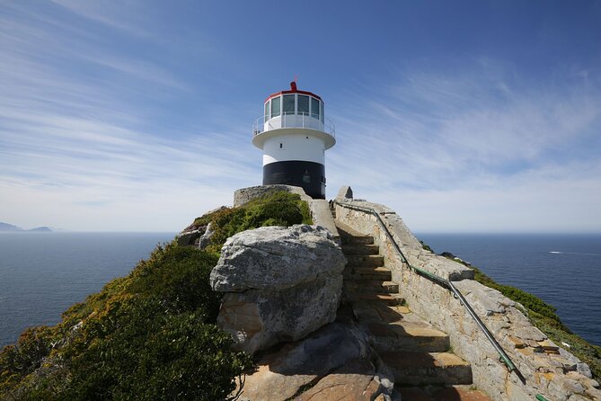 Full Day Private Cape Peninsula and Boulders Beach Tour - Muizenberg finishes with colorful beach huts