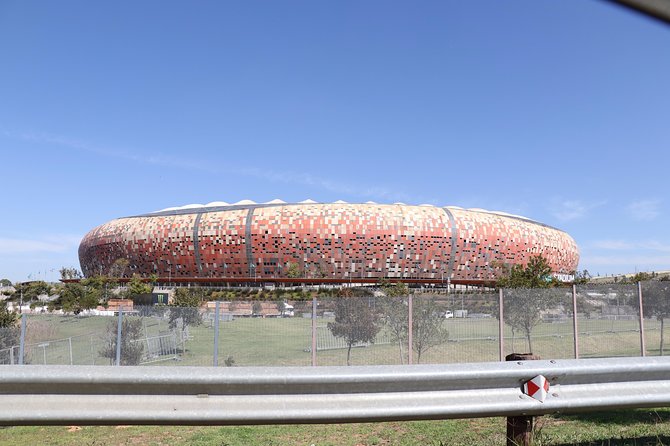 Full-Day Soweto Apartheid Museum & Johannesburg Tour - Walking through Kliptown