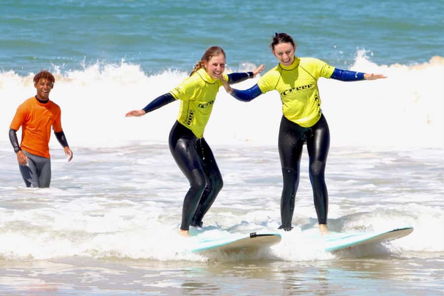 Jeffreys Bay: Learn to Surf Group Lesson - Practicing in waist-deep water