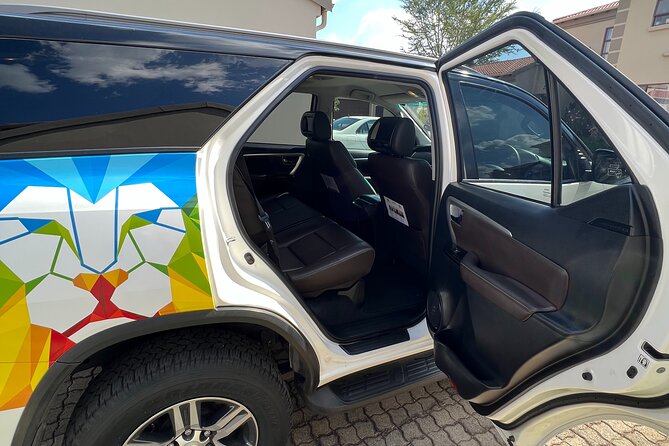 Johannesburg: Private Transfers from Airport to Hotel/Game Lodge - Leaving Johannesburg airport in a private Fortuner