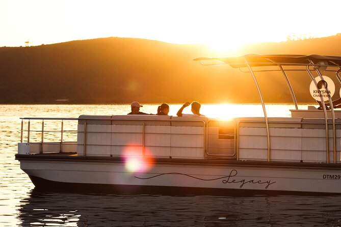Knysna Sunset Cruise - Oysters and white wine on the oyster boat