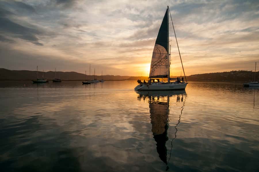 Knysna Sunset Sailing Cruise with Light Dinner and Wine - Meeting the Outeniqua at Knysna Waterfront