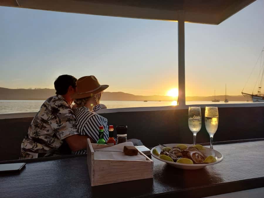 Knysna: Wine & Oyster Luxury Lounger Sunset Cruise - Leaving the Knysna Lagoon