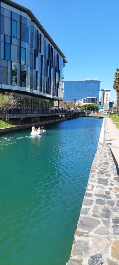 Pedal Boat Ride V&A Waterfront - Cape Town - Boarding a boat for two to six people