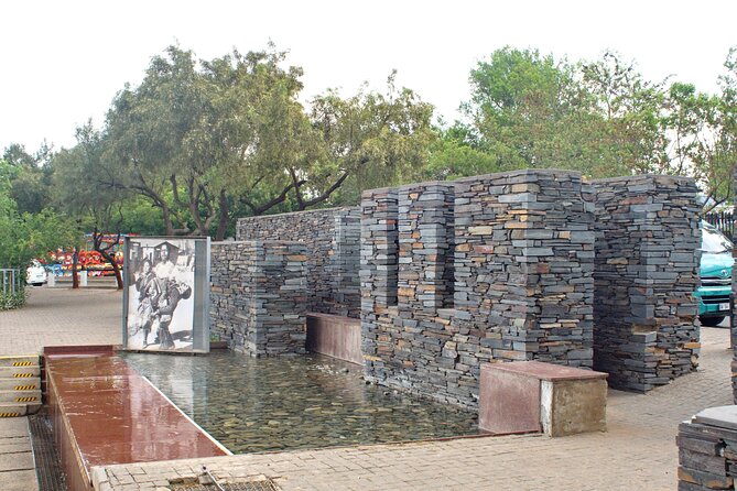 Private Tour of Johannesburg, Soweto and Apartheid Museum - FNB Stadium and the public memory of Mandela