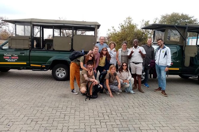 Shared Full Day Guided Safari Tour Visit to Kruger National Park - Entering Kruger National Park in an open 4x4