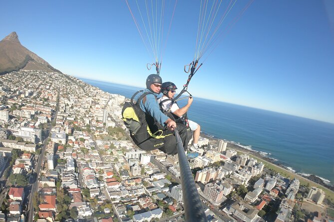 Tandem Paragliding in Cape Town with views of Table Mountain - The launch: exciting, quick, and controlled