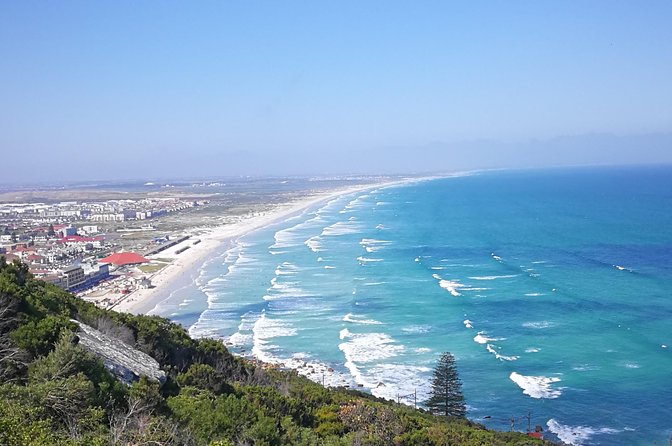 Woodstock art, Township cycling, Muizenberg beach and Chapman's Peak - Who will get the most from this experience